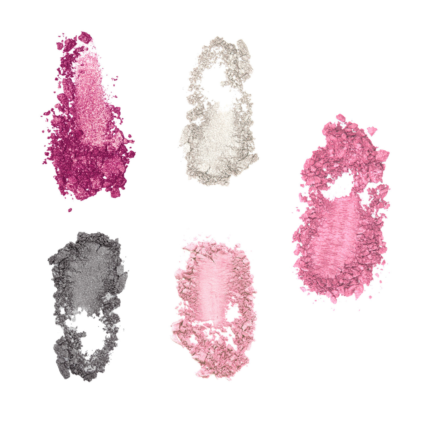 Smears of different decorative cosmetics on a white background isolated